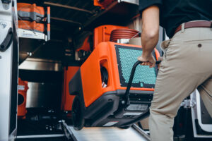 unloading water removal dryer for water damage removal - 911 Restoration in Oshkosh, WI